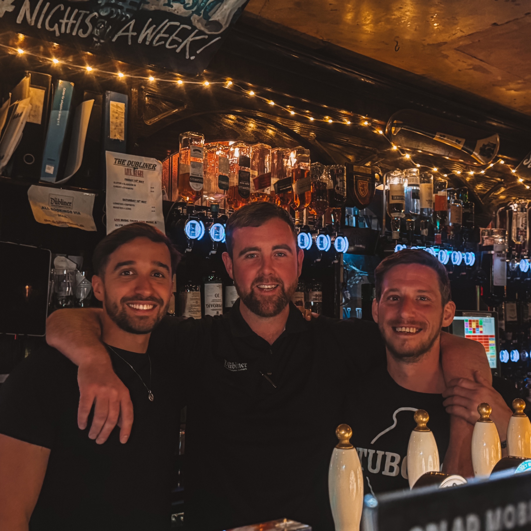 The lads behind the bar